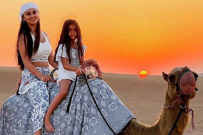 Dubai Desert Safari: Dune Drive Camel & 5<em> BBQ Shows Stargazing – Key points before you go’ /></p>
<ul>
<li><strong>Land Cruiser pickup and drop-off</strong> in a small shared group (max 6 guests)</li>
<li><strong>15-minute red dune bashing</strong> in the Lahbab Desert for real thrill time</li>
<li><strong>Camel ride, henna, and Arabic costume photos</strong> at the camp</li>
<li><strong>Sandboarding/sandsurfing included</strong> so you can try the classic desert activity</li>
<li><strong>Live entertainment at night</strong>: belly dance, Tanoura, and a fire show with a stargazing vibe</li>
<li><strong>Optional ATV quad bike and dune buggy</strong> available for extra cost if you want more speed</li>
</ul>
<h2 id="leaving-the-city-lahbab-dune-bashing-and-sunset-photo-timing">Leaving the City: Lahbab Dune Bashing and Sunset Photo Timing</h2>
<p><img width="669" height="446" decoding="async" src=