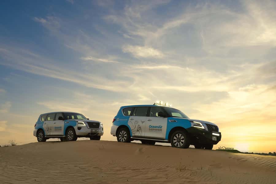 Dubai: Evening Desert Safari with Camel Ride & Stargazing - Sandboarding under stars: fun, but bring the right shoes